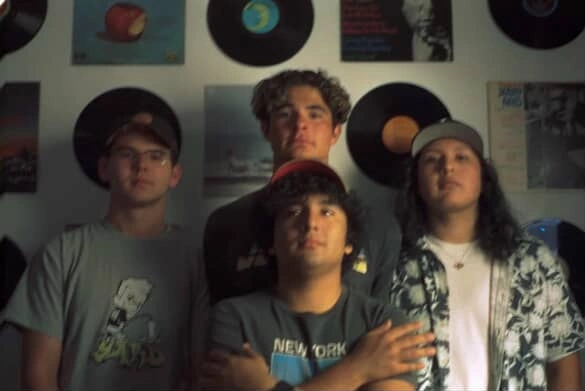 All four members of NEH in a group portrait