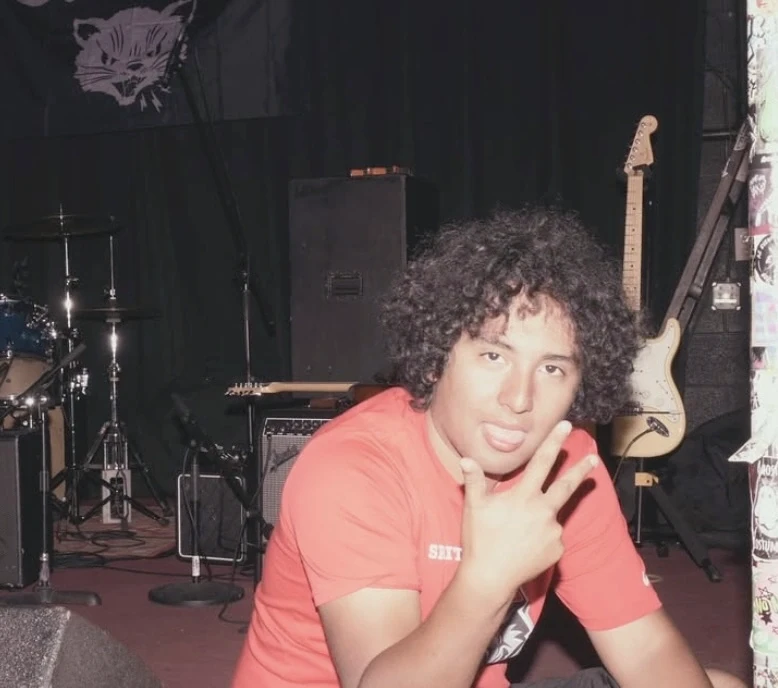 NEH member in a performance-space portrait